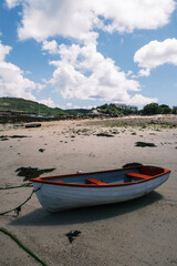 boat on the beach on the island of brier Isles of Scilly cornwall uk 