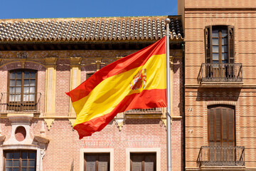 Malaga square with the flag of Spain called Square Constitution