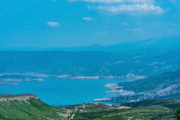 Fototapeta na wymiar mountain landscape with the reservoir of the Chirkey hydroelectric power station in Dagestan
