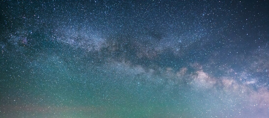 Beautiful bright milky way galaxy at the night sky. Astronomical background. © Inga Av