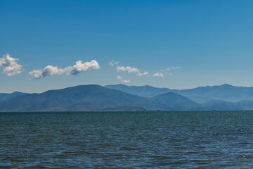Mountain and lake in the summer day