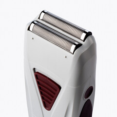 Rechargeable battery-powered foil shaver on white background