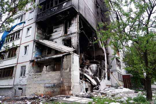 Damaged multi-apartment skyscrapers Russian planes and bombs.
