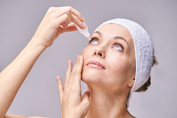 Young woman doing morning routine. Home maternity treatment. Health care concept. Female person....