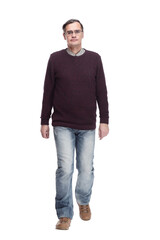 casual man in jeans and jumper striding forward