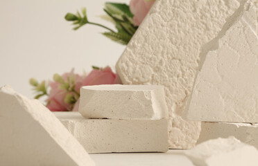 Empty stack of gypsum stones platform podium on beige background. Minimal empty display product...