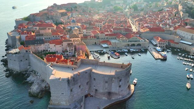 Dubrovnik old town at sunset, aerial view of historic city of Dubrovnik in Croatia, UNESCO World Heritage site in Croatia, famous tourist attraction in the Mediterranean