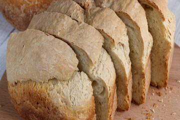 bread slicing on a wooden background
