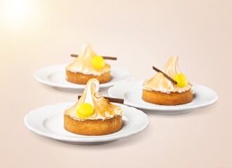 Lemon Cheesecake on white plate.