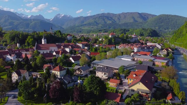 Rising Drone Video Of A Beautiful European Town With Lush Green Mountain Landscape in Kamnik, Slovenia