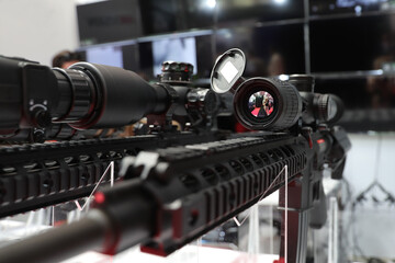 Detail view of the military scope mounted on a automated rifle optical part of a military weapon....