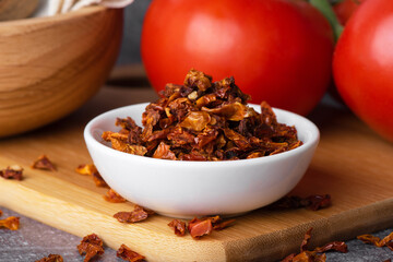 Dry tomatoes in a bowl. Red sundried tomatoes.