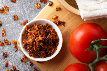 Dry tomatoes in a bowl. Red sundried tomatoes.
