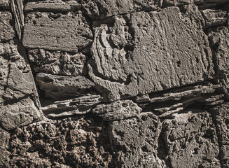 Rock background. Brick Silver Wall. Rock texture. Black texture. Dark marble. Stone background. Rock pile. Paint spots. Rock surface with cracks. Grunge Rough structure. Abstract texture.