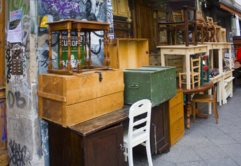 Vintage furniture and antiques in second hand store in Kreuzberg district in Berlin - obrazy, fototapety, plakaty