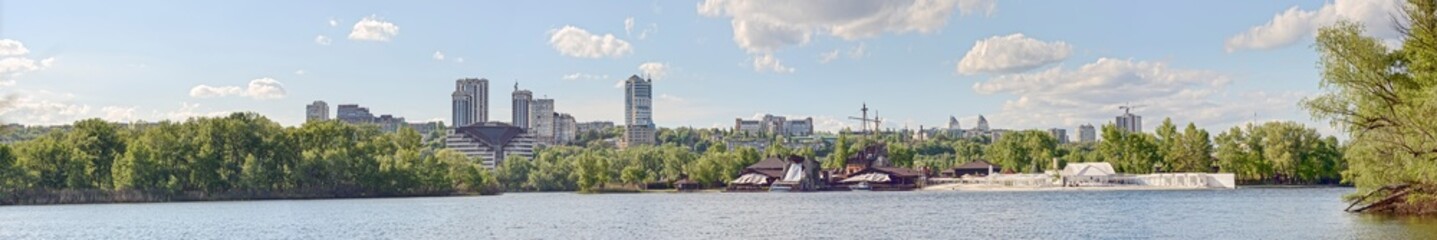 Fototapeta na wymiar Panorama of Dnepropetrovsk along rowing channel and Pobeda embankment, Ukraine.