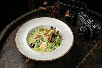 Okroshka on a wooden board 
