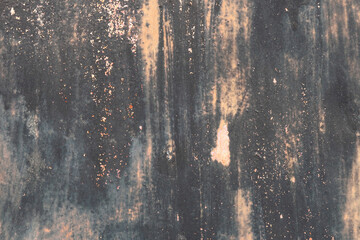 Dark abstract background. Black metal surface with peeling paint
