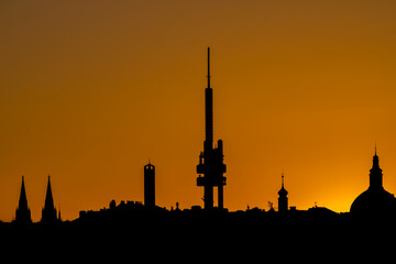 Naklejka premium Panoramic black silhouette of capital Prague before sunrise in spring morning