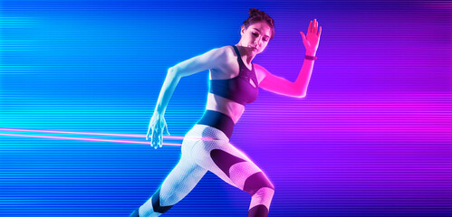 Fototapeta na wymiar Fitness woman performs exercises with resistance band on neon background