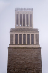 Old tower in the fog