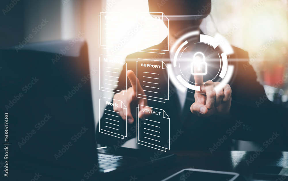 Poster hand using laptop and touch folder of document management system, online documentation database and 