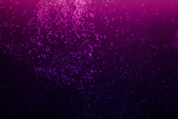 Purple sparkles on a black background. Blank for holiday, Christmas cards. Concept color of the year.