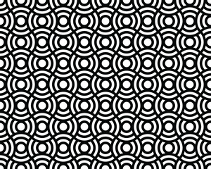 Seamless pattern with black circles on a white background