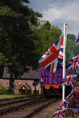 the taw valley re painted purple to celebrate the queens platinum jubilee traveling through Hampton Loade on its first trip since being re-named - obrazy, fototapety, plakaty