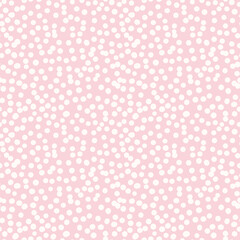 Polka dot vector seamless pattern. Irregular chaotic spots, circles. Simple abstract pink and white minimal background texture. Cute repeat design for print, cover, wallpaper, decor, textile