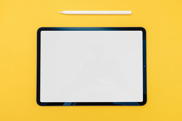 Tablet mock-up on yellow background