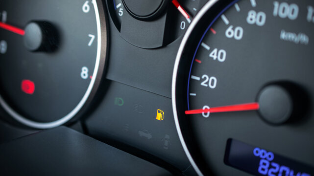 Gas gauge fuel empty. Petrol tank meter car indicator on dashboard. Low gasoline level. Fuel gauge gas.