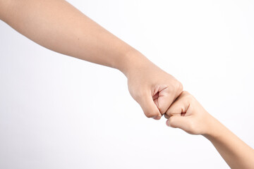 The punch to the punch represents the strength of the teamwork.