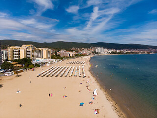 Aerial view of the sand beach and dune of Sunny Beach in Bulgaria. Summer holidays in Europe during...