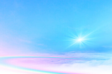 Colorful sky with soft white clouds and the crossing of rainbows. pastel colored magical fantasy background. Sweet Dreams concept for Wallpaper, Backdrops and Design.