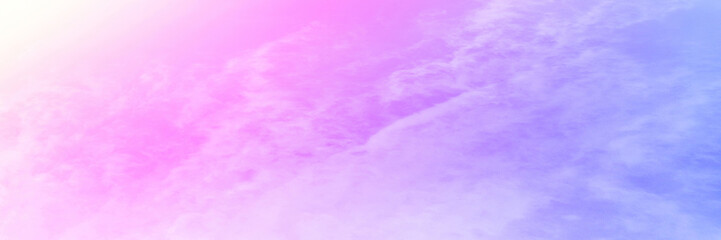 Pastel sky with soft white clouds. Fantastic color fantasy background. Sweet dreams concept for wallpaper, backdrop and design.