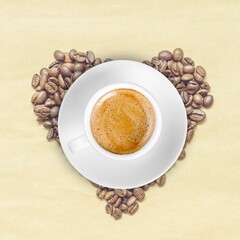 Espresso or black coffee in white cup with coffee beans.