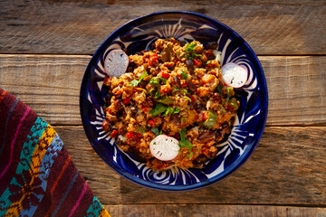 Chilli con carne in talavera plate. Mexican food