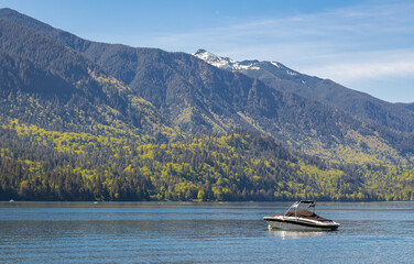 Landscape of a beautiful mountain lake and boat