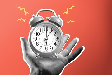 Human hand holding alarm clock on red background, idea concept - obrazy, fototapety, plakaty