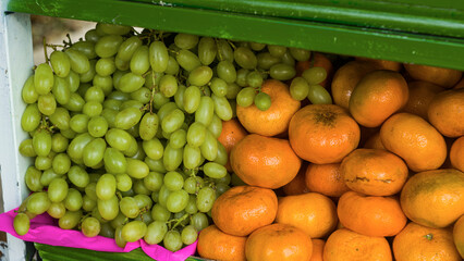 Bunch of Green Grapes and Tangerines