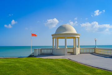 Hastings, England, 01.05.2022: neighborhood of a small coastal town, first line of the beach.