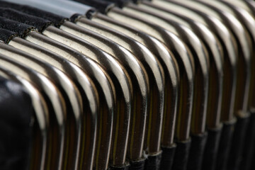 folklore musical instrument, handmade Russian accordion with painting and inlay, isolated on a white background