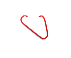 Red paper clip on white background