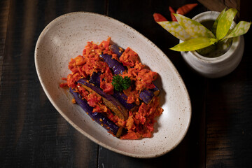 Balado is a red hot spicy sauce that you can use to stir fry all kind of food, with prawns, squids, eggs, potatoes, and eggplants being the most popular choice.