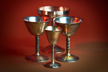 Two magical goblets crossed read for casting spells or ceremony