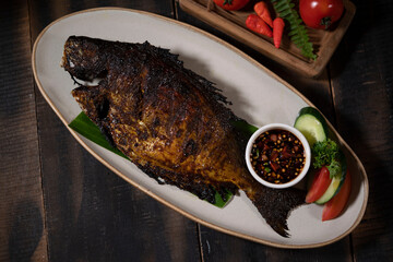 Fried Baronang Fish with Chili and Sweet Soy Sauce is Spicy and refreshingly sour and delicious seafood dish.