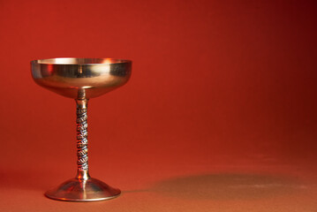 Two magical goblets crossed read for casting spells or ceremony