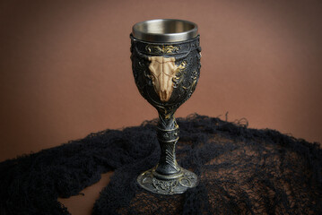 A ritual wiccan goblet used for ceremonies or casting spells - obrazy, fototapety, plakaty