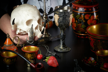 Dangerous witch preparing here dark magic with here mystical items